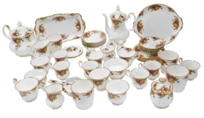 Royal Albert Old Country Roses tea and coffee ware, etc., including teapot, coffee pot, sugar bowl, slop bowl, mugs, cups, saucers and plates, and condiment pieces. (2 trays)