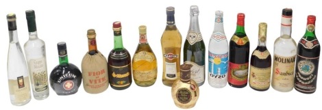 An assortment of various Continental liqueurs and alcohol, including O-Barack Apricot Brandy, Fior di Vite, Unicum Zwack, Oyzo, etc. (14)