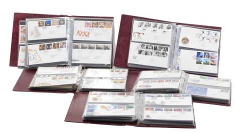 A collection of Royal Mail first day covers, dating from 1986, in five albums, each containing approximately seventy plus first day covers.