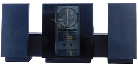 A Bang & Olufsen Beosystem 2500, CD and tape player Hi-Fi system, with two integral speakers.