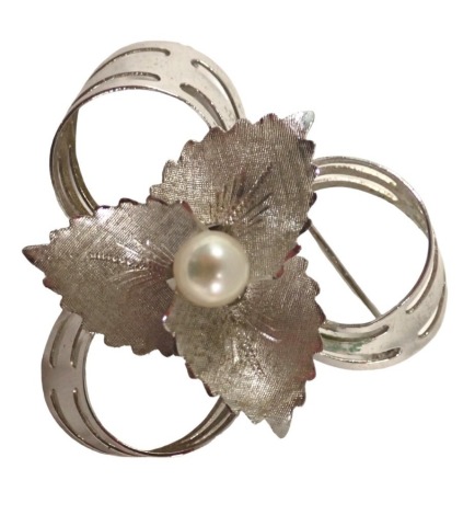 An Italian floral brooch, of pierced three cross decoration, with three central leaves and cultured pearl, white gold stamped 750, 3.5cm diameter, 6.5g all in.