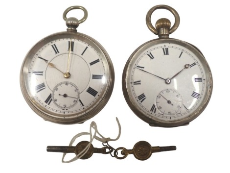 Two George V and later pocket watches, comprising a silver cased pocket watch, with white enamel Roman numeric dial, gold hands and seconds dial, white metal stamped 935, key wind, and a further bezel wind example, stamped 925, 191.1g all in. (2)