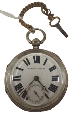 A Victorian silver pocket watch, with white enamel Roman numeric dial, and seconds dial, Chester 1876, key wind, with a brass part chain, 151.7g all in.