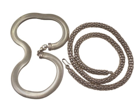 Two neck chains, comprising a snake link chain, white metal stamped 925, and a woven style white metal chain, stamped 925, 121.8g all in.