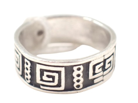 A dress ring, on blackened background, with Greek style key decoration, white metal stamped 925, ring size U, 5.3g all in.