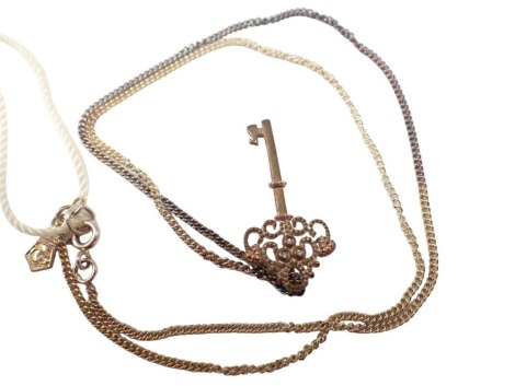 A Glogau pendant and chain, formed as a key pendant, set with three tiny white stones 3cm high, on a fine link neck chain, 44cm long, white metal unmarked, 5.3g all in, boxed.