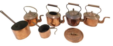 A group of copper kettles etc., comprising four copper kettles, one lacking lid, and two copper saucepans.