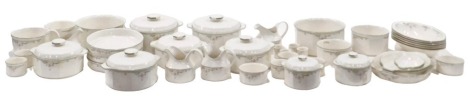 A Royal Doulton Caprice dinner service, circa 1988, including large vegetable tureens, smaller tureens, gravy boats, ovenware dishes, and circular flan dishes, etc. (approximately 40 pieces)