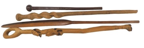 Tribal sticks and clubs, including a hardwood knobkerrie, hardwood staff, and a figural walking stick. (4)