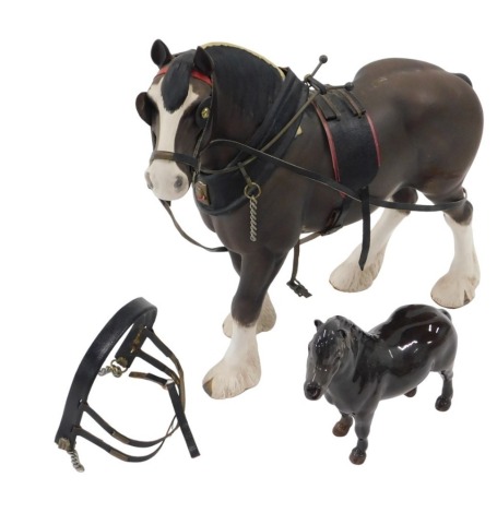 A Beswick model Shire horse and Shetland pony, in matt finish, 26.5cm high, and pony 12 cm high.