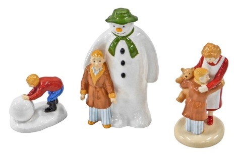 Coalport Snowman figures, comprising The Snowman money box, Building The Snowman, and Hug for Mum, all with boxes.