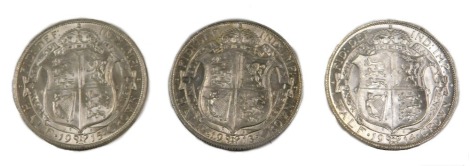 Three George V silver half crowns, comprising 1914, 1915, and 1913.