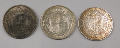 Three Victorian and later silver half crowns, comprising 1887, 1899, and a George V 1923. (3) - 2