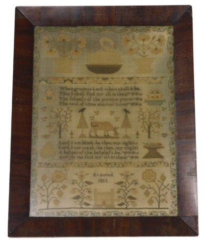 19thC needlework sampler, with prayer text and within borders of trees, shrubs, animals, by E Acred dated 1823, 42cm x 31cm, in figured mahogany framed.