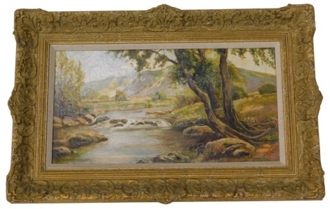 Early 20thC English School. A river scene in summer, with hills in the background, oil on canvas laid on board, 30cm x 61cm.