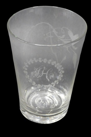 A 19thC ale glass, of tapered beaker shaped design, engraved with hops and barley, and with initials JH within a wreath.