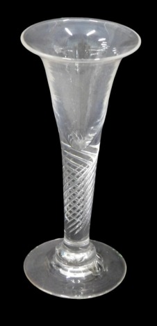 A heavy 18thC style wine glass, with flared tapered bowl and heavy air twist stem, with knopped foot.