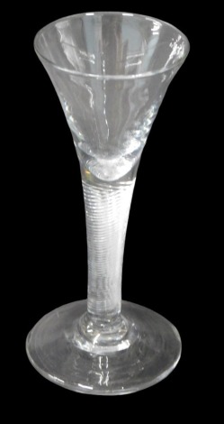 An 18thC style wine glass, with conical tapered bowl, and tapered air twist stem, with tapered foot.