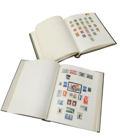 Two albums of European stamps, various definitive and commemorative, including Albania, Czechoslovakia, Finland, Greece, Russia, Siberia, Vatican City, and Yugoslavia, etc.