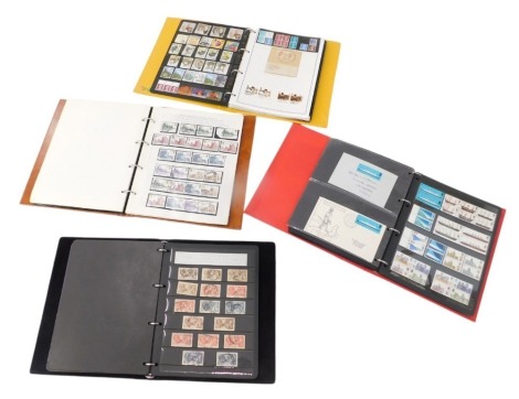 Four albums of British stamps, including Elizabeth II definitives, Victoria penny reds, and other Victoria stamps, George V/George VI definitives, some first day covers, etc., some facsimiles included.