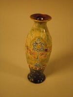 A Doulton Lambeth stoneware vase decorated in Willow leaf