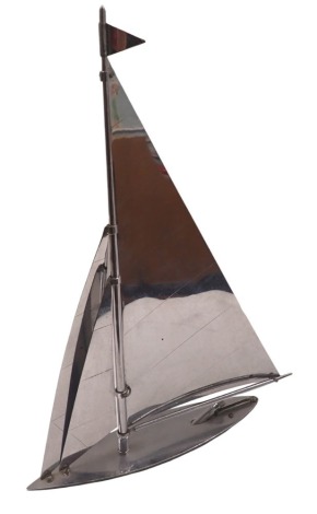 A Parker Yacht lighter, the masted top with chrome decoration, with a blackened base, 35cm high, 20cm wide, and 4cm deep.