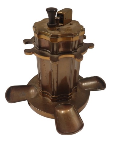 A Ronson Grand Slam BZQ table lighter, in brass finish, with central lighter, and four outer wells, formed as a fountain, 15cm high, 14cm wide.