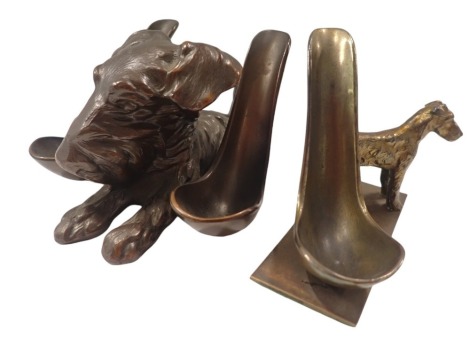 Two Ronson dog ash trays, comprising a single dog on rectangular base, with shaped ash bowl, 9cm high, 10cm wide, 3cm deep, and a further example of a seated dog, with pipe rests to the side, 10cm high, 12cm wide. (2)