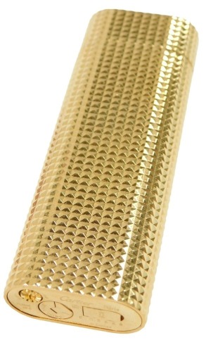 A Cartier pocket lighter, in gold coloured casing, numbered 056668, boxed.