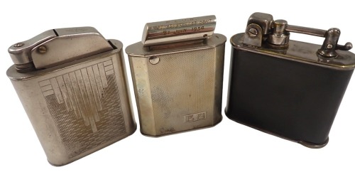 Three table lighters, comprising a Lancel Art Deco black enamel and chrome table lighter, 10cm high, a silver plated lighter stamped DP, bearing the initials ES, presentation for the son of a president 1954, 10cm high, and a Floating chrome cased table li