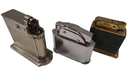 Three table lighters, comprising a Rowenta chrome engine engraved lighter, 11cm high, and a Myon lighter, with two cross shield decoration, 8cm high, and a Shagreen style brass lighter, 8cm high. (3)