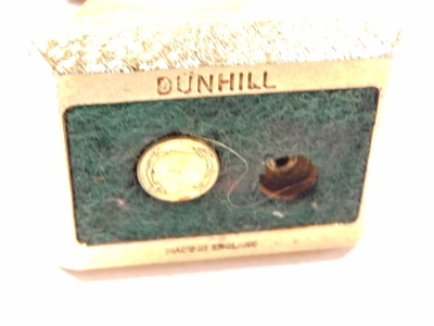 Withdrawn pre-sale. Six Dunhill table lighters, comprising two Tall Boy, one in silver coloured finish, the other in gold, and three other Dunhill table lighters and one pocket lighter. (6) - 2