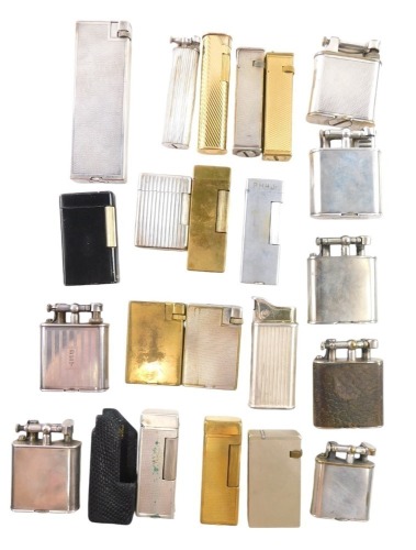 Withdrawn pre-sale. A selection of Dunhill lighters, to include five early single wheel lighters, Dunhill unique, handy and others, in either chrome or gold coloured finished cases, in fitted display case. (22)