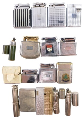 A group of Colibre pocket lighters, stainless steel case, some with enamel decoration bearing shields, some formed as columns, boxes, one with Ireland crest, in fitted case.