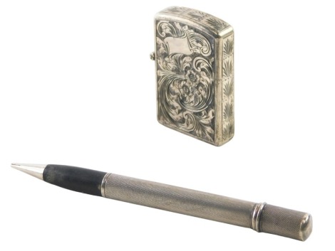 An engine engraved cased pocket lighter, of flower design with a vacant crest, unbranded with flip top, in a Capini & Co silversmiths of Florence case, unmarked, and an Everett pencil in silver case stamped 935. (2)