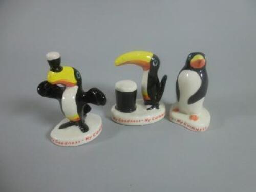 Three Carlton ware Guinness figures