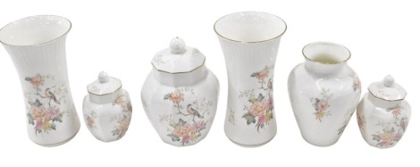 Six Royal Doulton Mystic Dawn pattern vases, comprising two octagonal jars and covers, two stem vases, 23cm high, and jar and cover, boxed. (6)