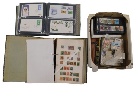 A collection of philatelic first day covers and stamps, including a general collection of world stamps (1 album), British commemorative stamps, Victoria penny reds, a quantity, and some cigarette cards, etc.