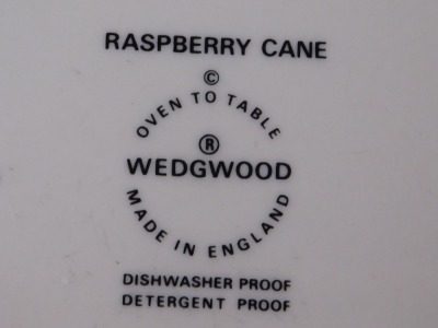 A Wedgwood Raspberry Cane pattern part dinner service, comprising oval tureen, circular tureen, ramekin and saucer, five teacups, milk jug, sugar bowl, oval serving plate, six dinner plates, four medium plates, eleven side plates, and five saucers. - 2