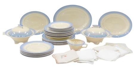 A Royal Doulton Art Deco finish part service, on a blue striped and cream ground, comprising two tureens and covers, oval serving plate, gravy boat, six dinner plates, six soup bowls, six side plates, and six medium plates, together with a small group of 