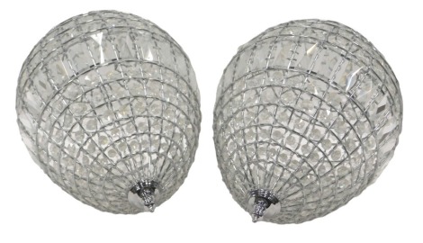 A pair of 20thC chandeliers, each fitted with crystals and three point top, 50cm high, with chrome fitments.