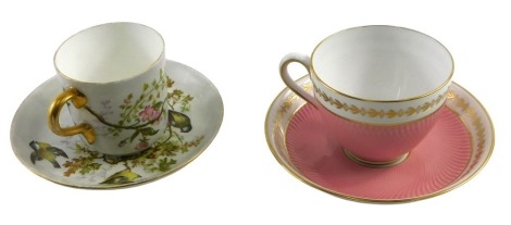 Two 20thC cups and saucers, comprising a Coalport swallow painted and gilded cup and saucer, and a Spode pink and gilt ground teacup and saucer. (2)