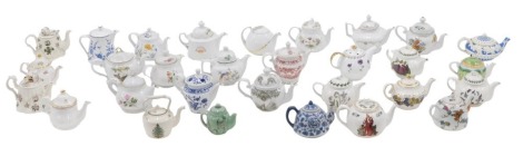 A collection of small teapots, to include porcelain, Portmeirion, Wedgwood, Minton, and others. (3 trays)