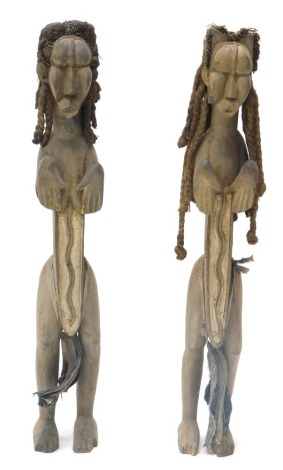 Tribal Art. A pair of Koulango spiritual wedding figures, Cote D'Ivoire, 82cm high.