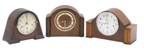 Three 1950s and later oak cased mantel clocks, each with chrome border, two with numeric dials, one with Roman numeral dial, each with eight day movement. (3)