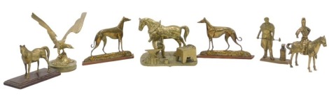 Various brass figures, comprising shire horse, two blacksmiths, two greyhounds, eagle on perch, Middle Eastern figure on horseback, and horse on plinth. (8)