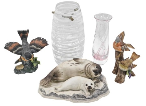 Two Royal Meridian bird figure groups, a Boehm seal and pup figure group, a ribbed Art Glass light shade, and a Caithness pink swirl bud vase. (5)