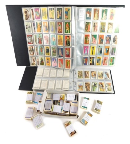 A large quantity of cigarette cards, trade cards, etc., to include some new old stock tea cards, etc.