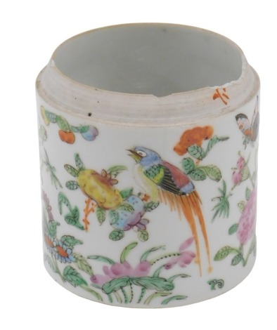 A 19thC Cantonese cylindrical pot, highly decorated with butterflies and berries, lacking lid, 8cm high. (AF)