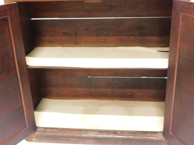 A Victorian mahogany bookcase, with plain moulded cornice to the upper glazed case, with three adjustable shelves enclosed by two glazed doors, stepped base with cupboard enclosed by two panelled doors and with plinth base, 206cm high, 107cm wide, 44cm de - 2